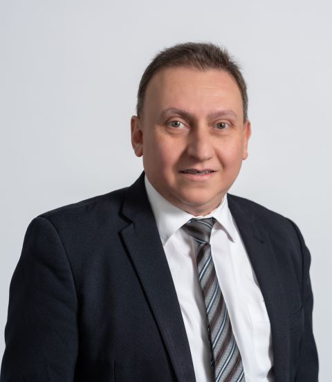 A portrait style photograph of Hussam Fraij